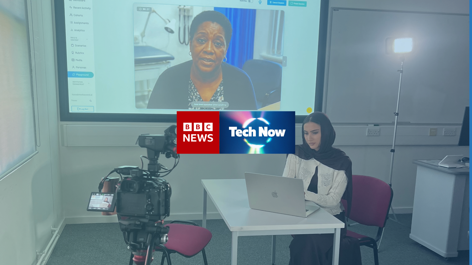 BBC News and BBC Tech Now logos overlaid on a filming scene at the University of Dundee showing a student using MedAscend