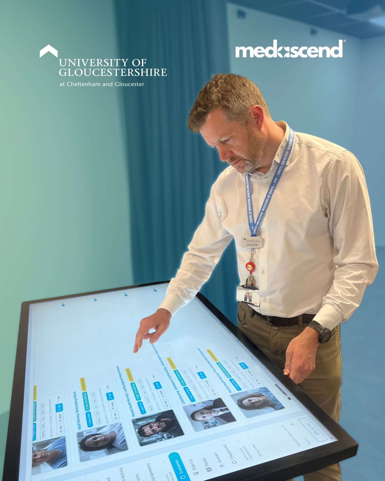 Simon Kersey at the University of Gloucestershire's FutureSim centre exploring the MedAscend platform on a large interactive display